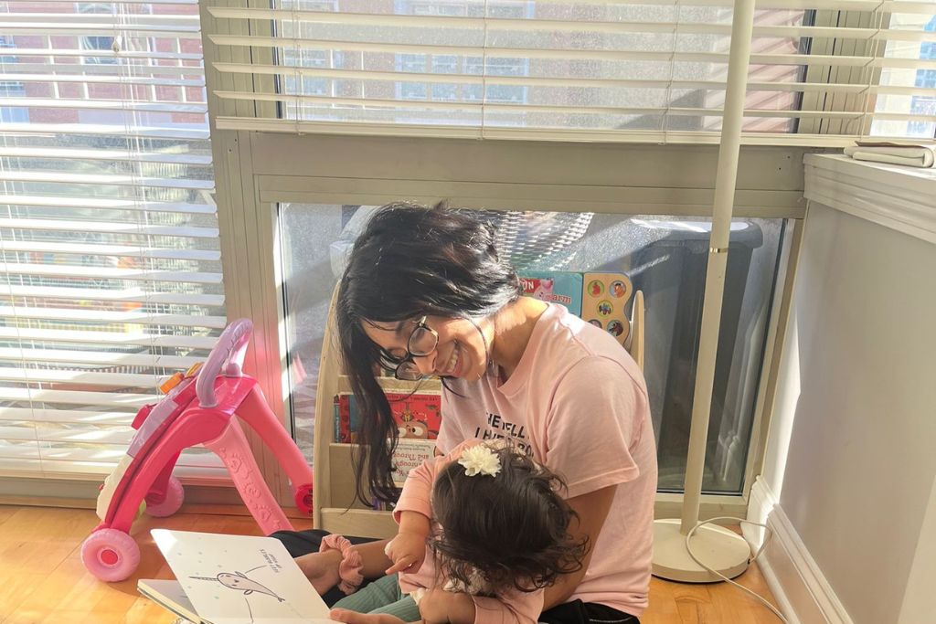 Me reading with my little as a part of our toddler morning routine