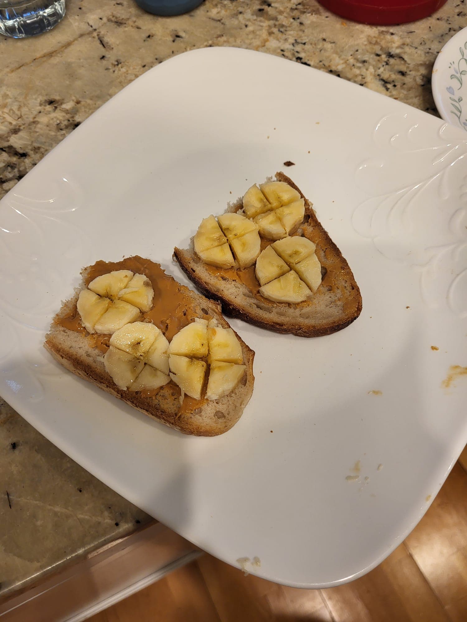 banana peanut butter toast cut in half