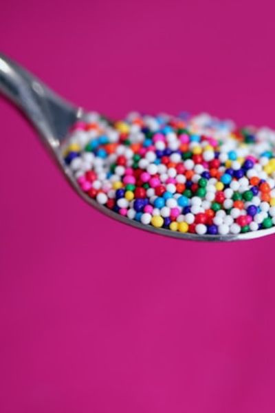 sugary sprinkles on a spoon - which you won't find in the best toddler toothpastes!