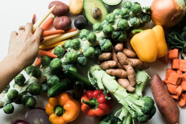 vegetables strewn across a counter, just like they are during toddler meal prep